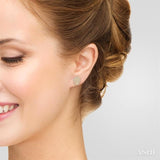 1/5 Ctw Double Halo Pear Shape Petite Round Cut Diamond Fashion Stud Earring in 10K Yellow Gold