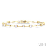 1 1/3 Ctw Bezel Set Emerald and Round Cut Diamond Bar Link Bracelet in 14K Yellow Gold