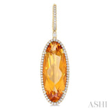 20x8 MM Oval Cut Citrine and 1/2 Ctw Round Cut Diamond Halo Semi-Precious Earrings in 14K Yellow Gold