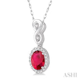 6x4 MM Oval Cut Ruby and 1/10 Ctw Round Cut Diamond Pendant in 14K White Gold with Chain