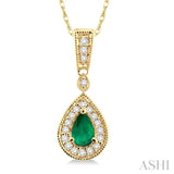 6x4mm Pear Shape Emerald and 1/6 Ctw Round Cut Diamond Pendant in 14K Yellow Gold with Chain