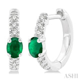 1/10 ctw Petite 4X3MM Oval Cut Emerald and Round Cut Diamond Fashion Huggies in 10K White Gold