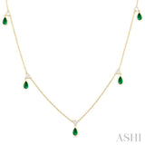 1/8 ctw Round Cut Diamonds and 5X3MM Pear Shape Emerald Precious Station Necklace in 10K Yellow Gold
